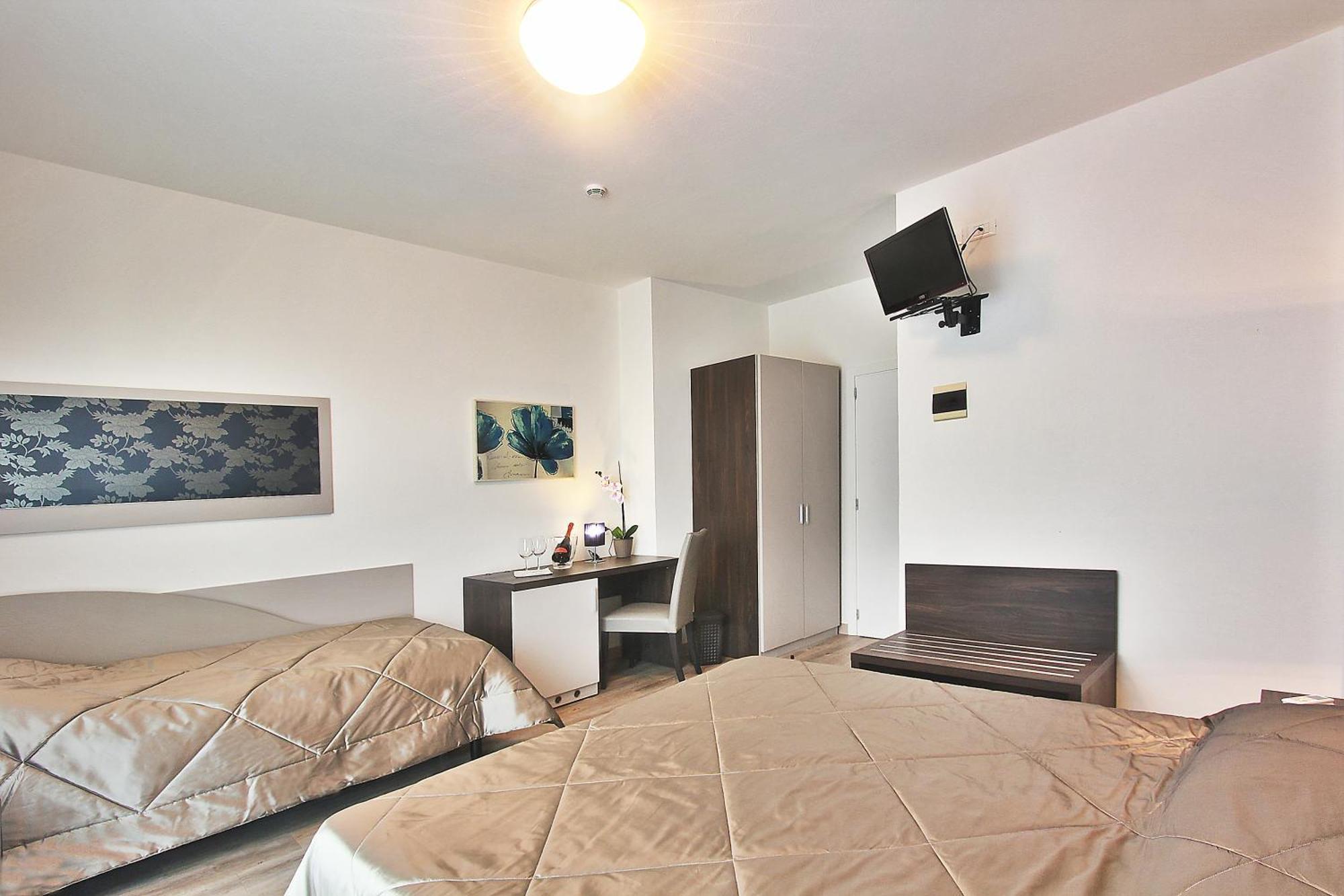 Hotel Gambrinus Lignano Sabbiadoro Oda fotoğraf